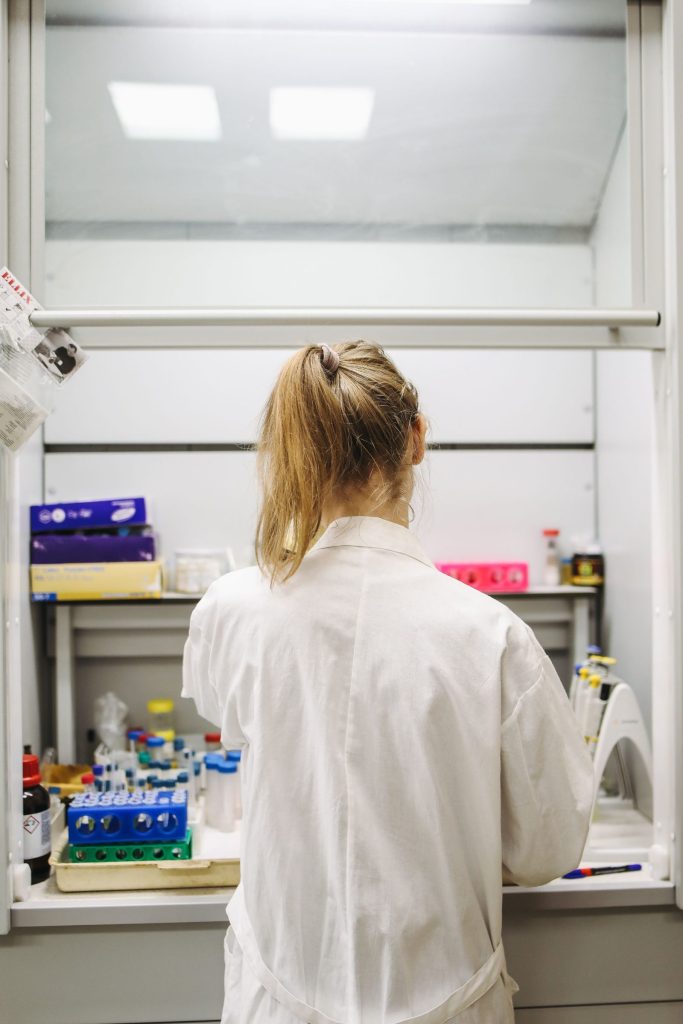 Scientist working in a modern laboratory, representing PhD doctoral research