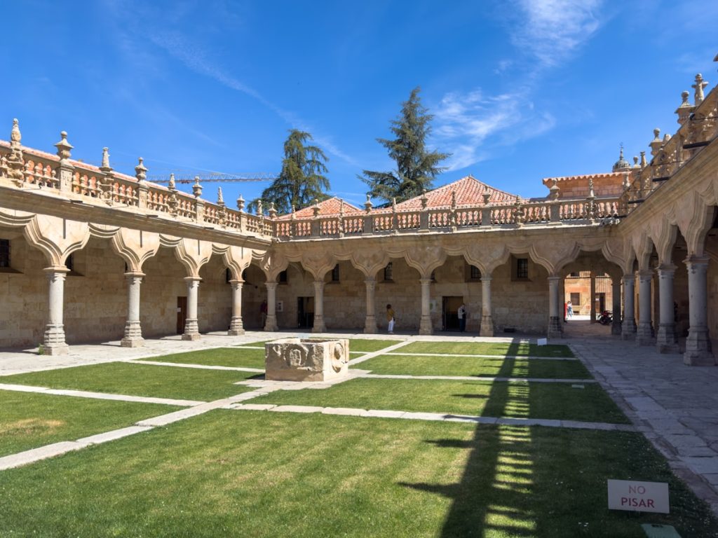 Historic stone cloister at a Spanish university representing studying in Spain