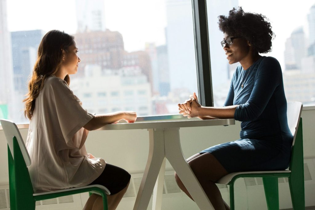 Prospective student talking with an admissions interviewer